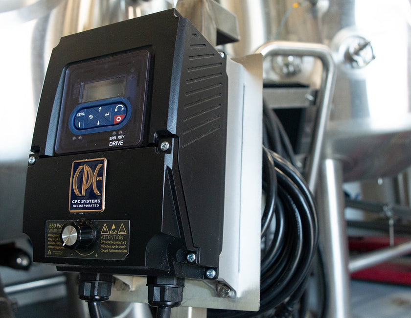 How does using a variable speed drive reduce energy consumption and cost?