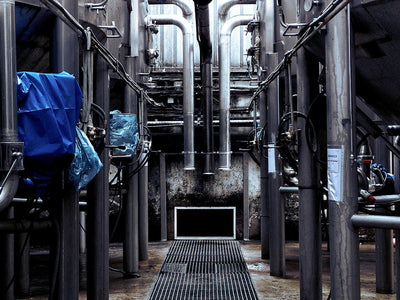 Why does my pump have an open area between the pump head and motor?